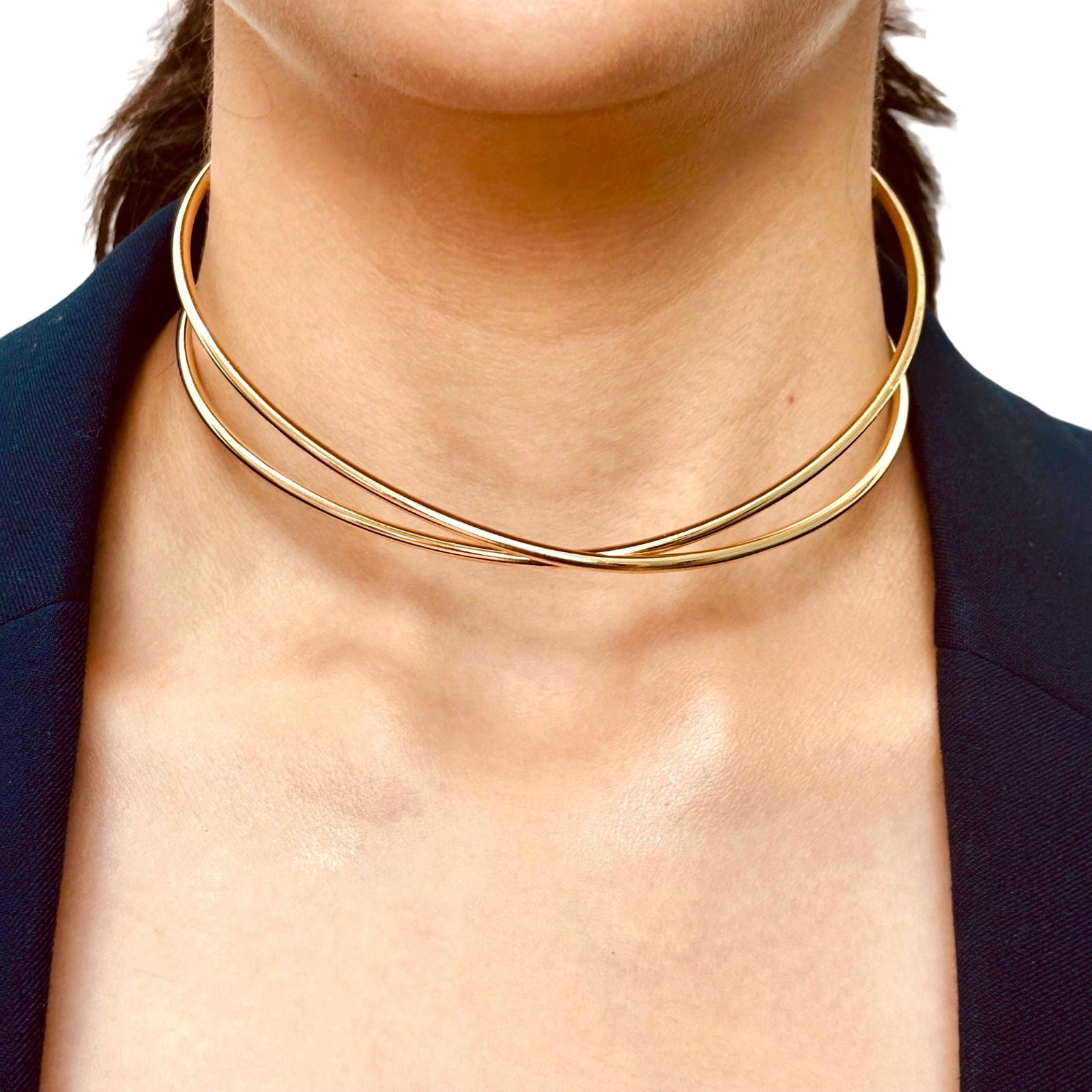 Model wearing double-layered gold hasli necklace for layered look - Statement elegant chic gold plated necklace - Rakhi gifts for sister under 2000 - jewelry Raksha Bandhan gifts