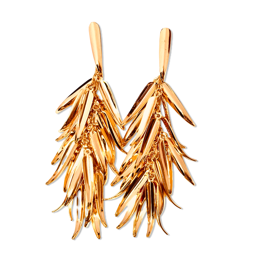 Close-up image showing hypoallergenic layered leaves and gold chain movement and premium shine - Model wearing long leaf tassel earrings – anti-tarnish 18K gold plated stainless steel statement dangle earrings birthday gift under 2000 - waterproof 18K gold plated tassel chandalier dangle party earrings anniversary gift for her under 2000 - Rakhi gifts for sister under 2000 - jewelry Raksha Bandhan gifts - gold earrings under 1500