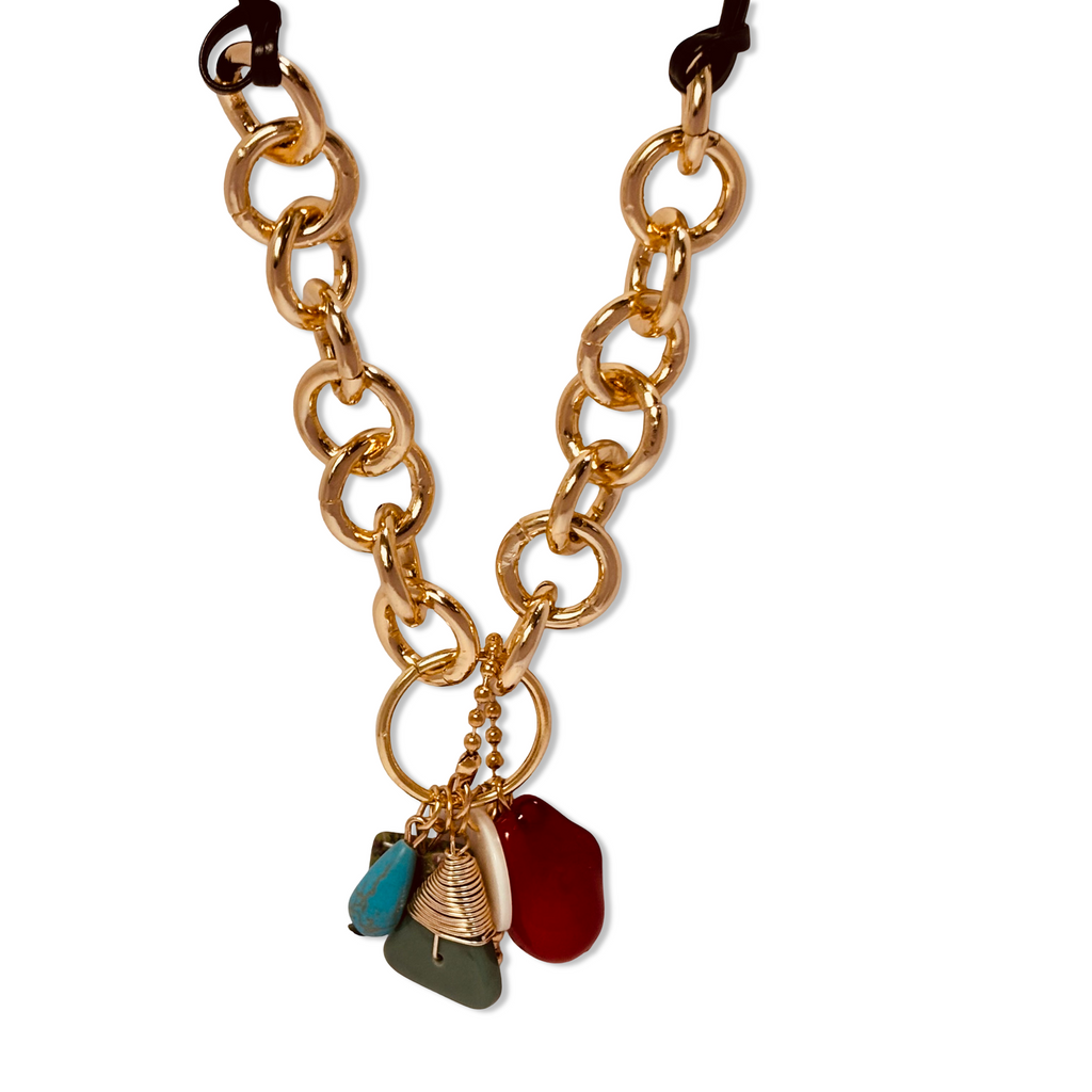 Close-up of faceted stones and thick gold links on black chord - Statement elegant gold plated necklace/pendant/choker - hypoallergenic anti‑tarnish waterproof nickel‑free gold plated necklace 