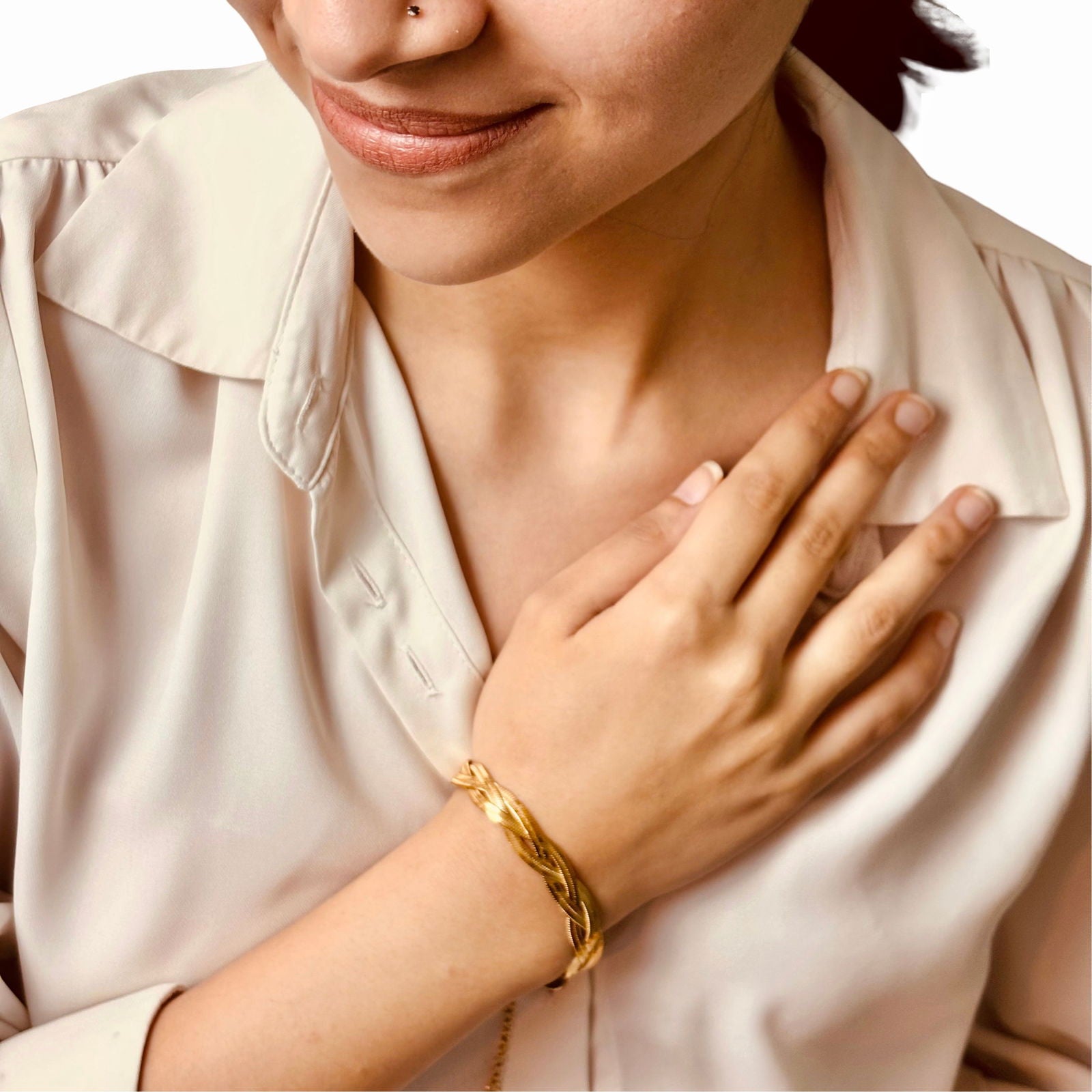 Model wearing minimalist waterproof 18K gold plated stainless steel braided snake chain bracelet birthday gift ideas under 2000 – sleek dainty anti-tarnish snake chain for daily wear under 1500 - Rakhi gifts for sister under 2000 - jewelry Raksha Bandhan gifts - gold bracelet under 2000