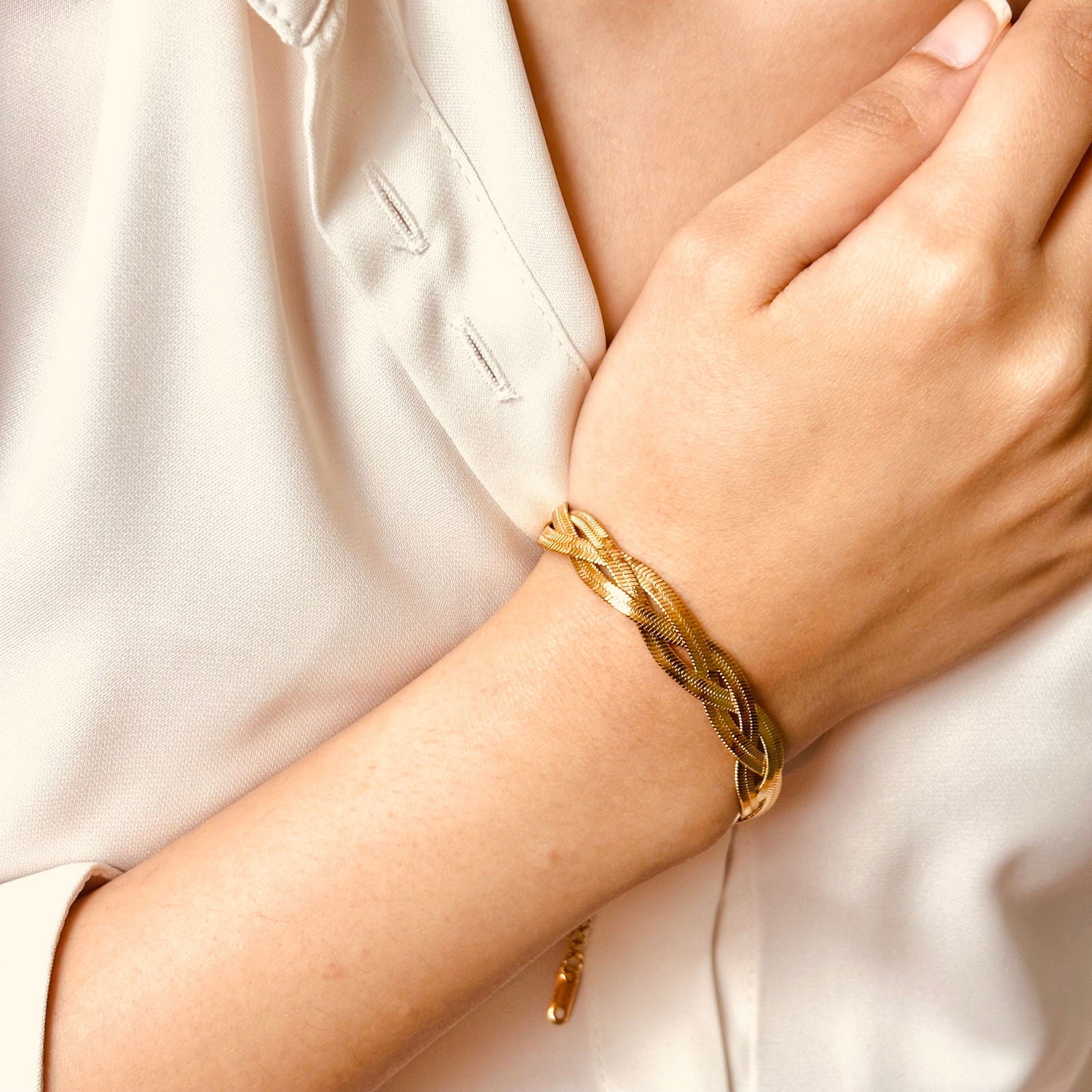 Model wearing braided snake bracelet – minimalistic chic accessory