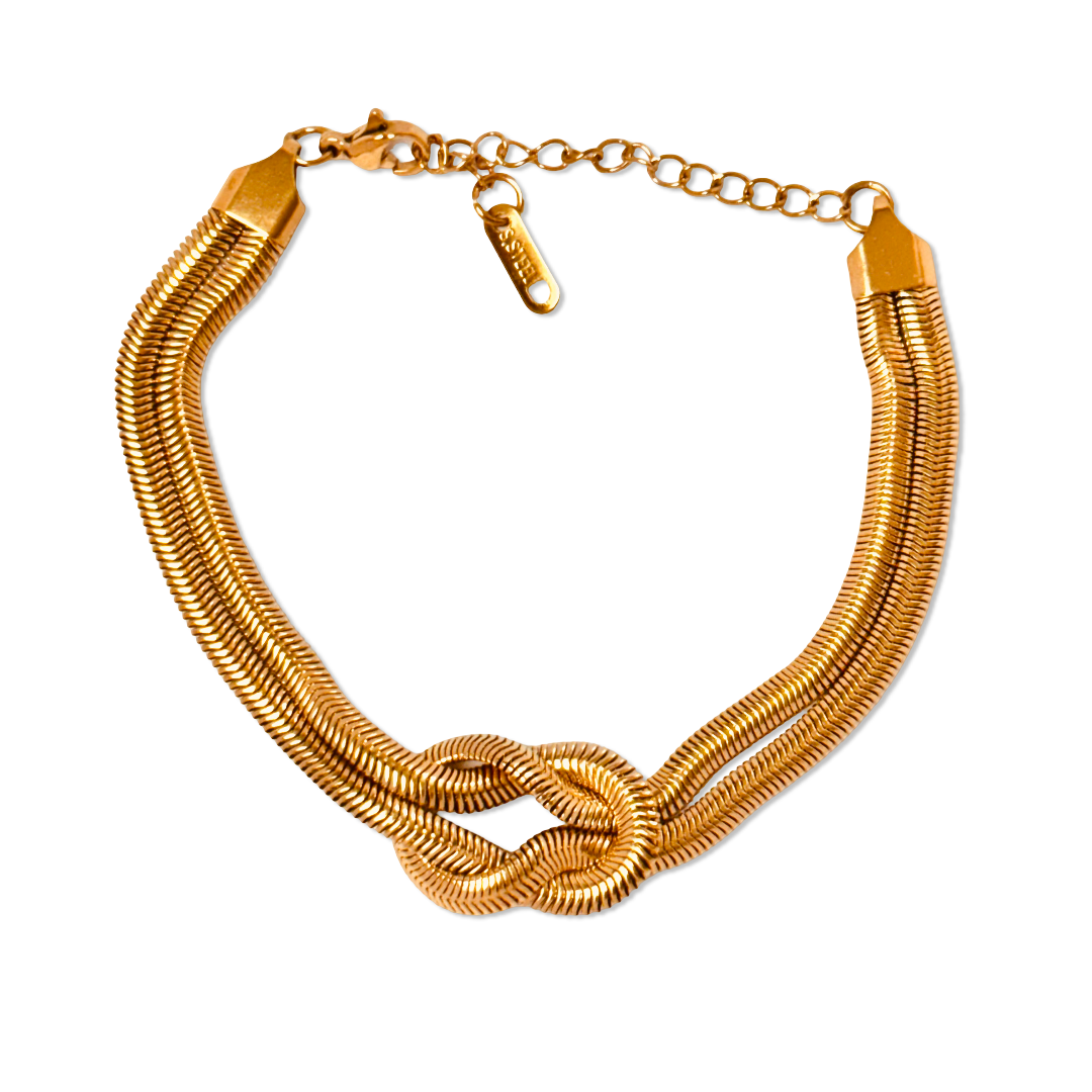 Flat display of snake chain knot bracelet – minimalist gold bangle