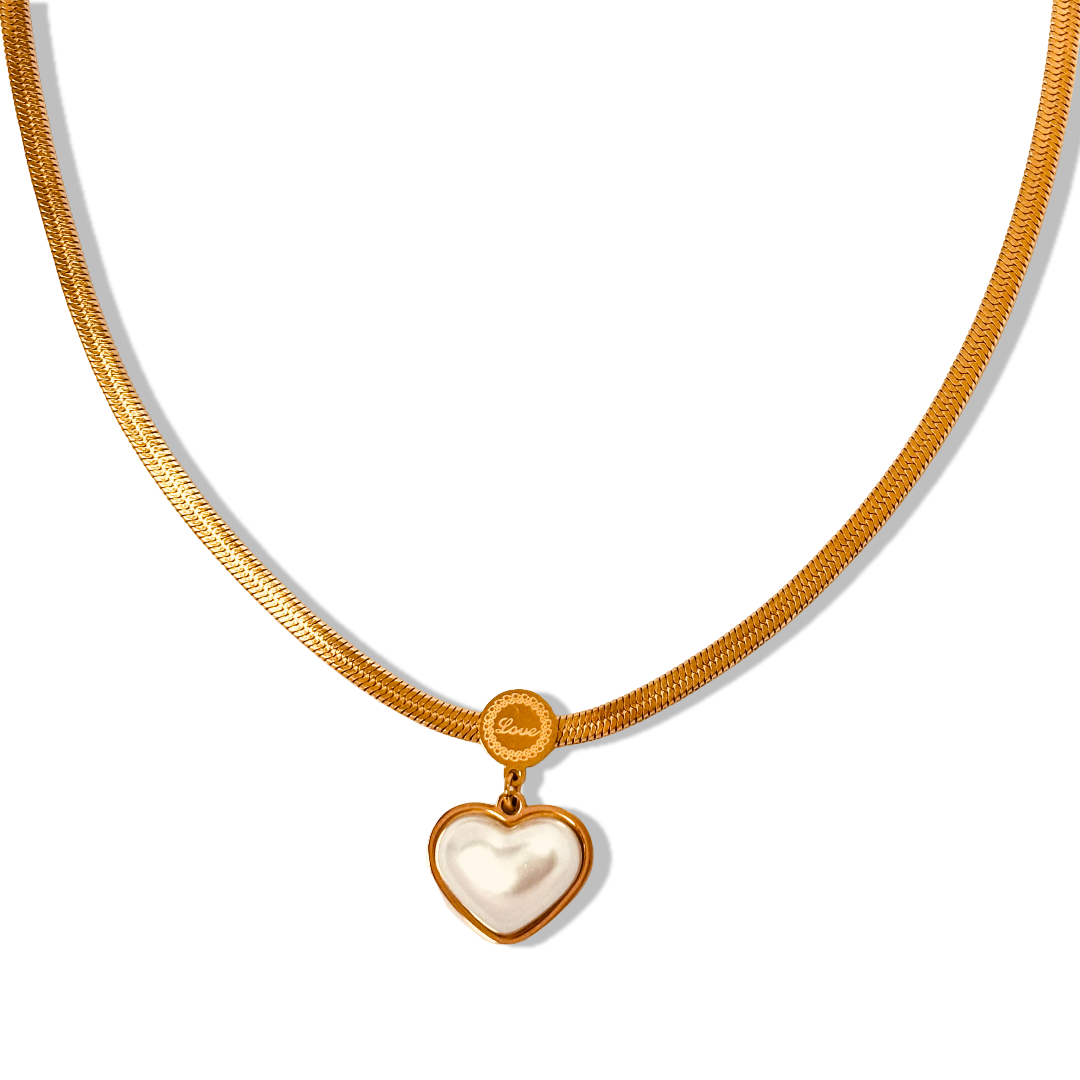 Flat display of heart pearl pendant necklace – delicate gold style