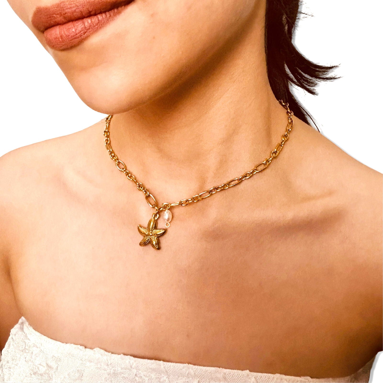 Model wearing chic anti-tarnish 18K gold-plated starfish and baroque pearl stainless steel necklace under 2000 gift ideas - minimalist gold plated starfish and baroque pearl chain waterproof necklace under 2000 birthday gift for her ideas – seaside elegance pendant under 1500 anniversary gift for her ideas - dainty gold plated hypoallergenic necklace gift under 2000 - Rakhi gifts for sister under 2000 - jewelry Raksha Bandhan gifts