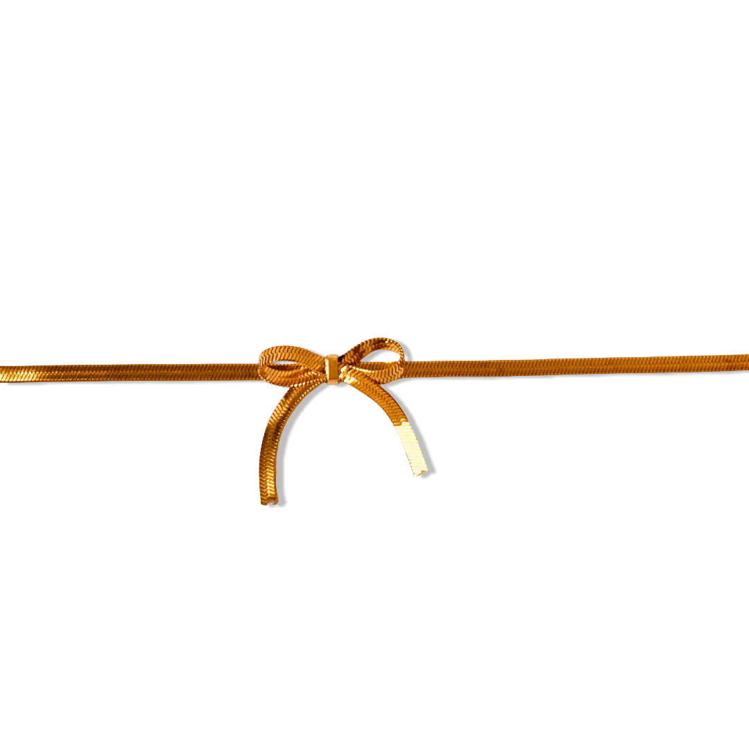 Front profile of bow bracelet highlighting sleek snake chain design