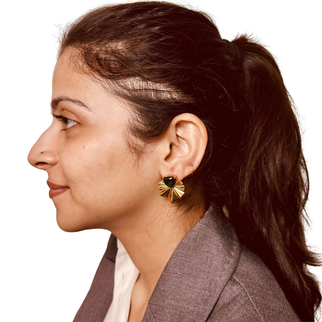 Model wearing emerald heart earrings – 18K gold-plated studs with deep green crystal - dainty chic minimalist elegant gold plated earrings - hypoallergenic anti‑tarnish waterproof nickel‑free lead‑free gold plated earrings - scratch‑resistant fade‑resistant water‑resistant gold plated earrings 