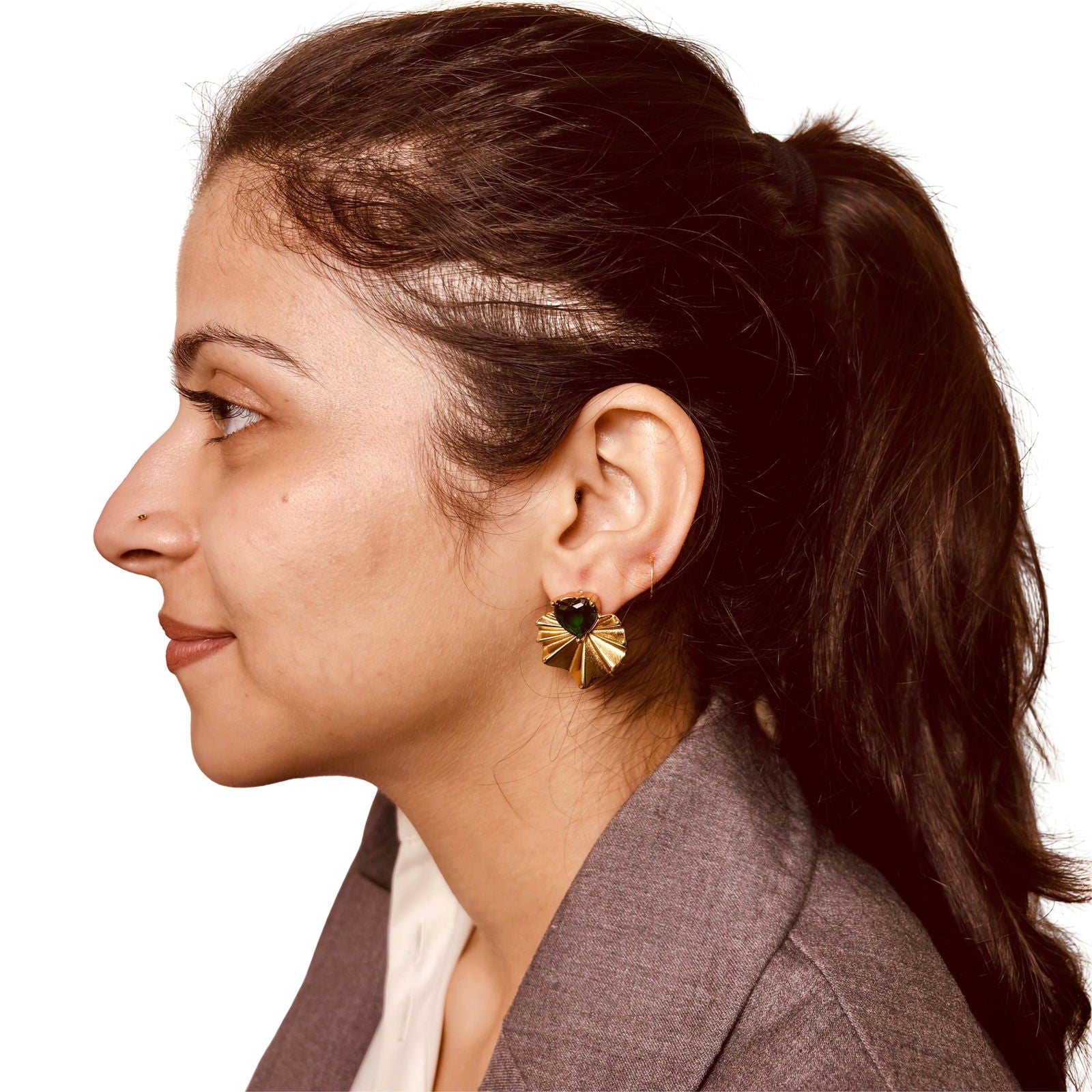 Model wearing emerald heart earrings – 18K gold-plated studs with deep green crystal - dainty chic minimalist elegant gold plated earrings - hypoallergenic anti‑tarnish waterproof nickel‑free lead‑free gold plated earrings - scratch‑resistant fade‑resistant water‑resistant gold plated earrings 
