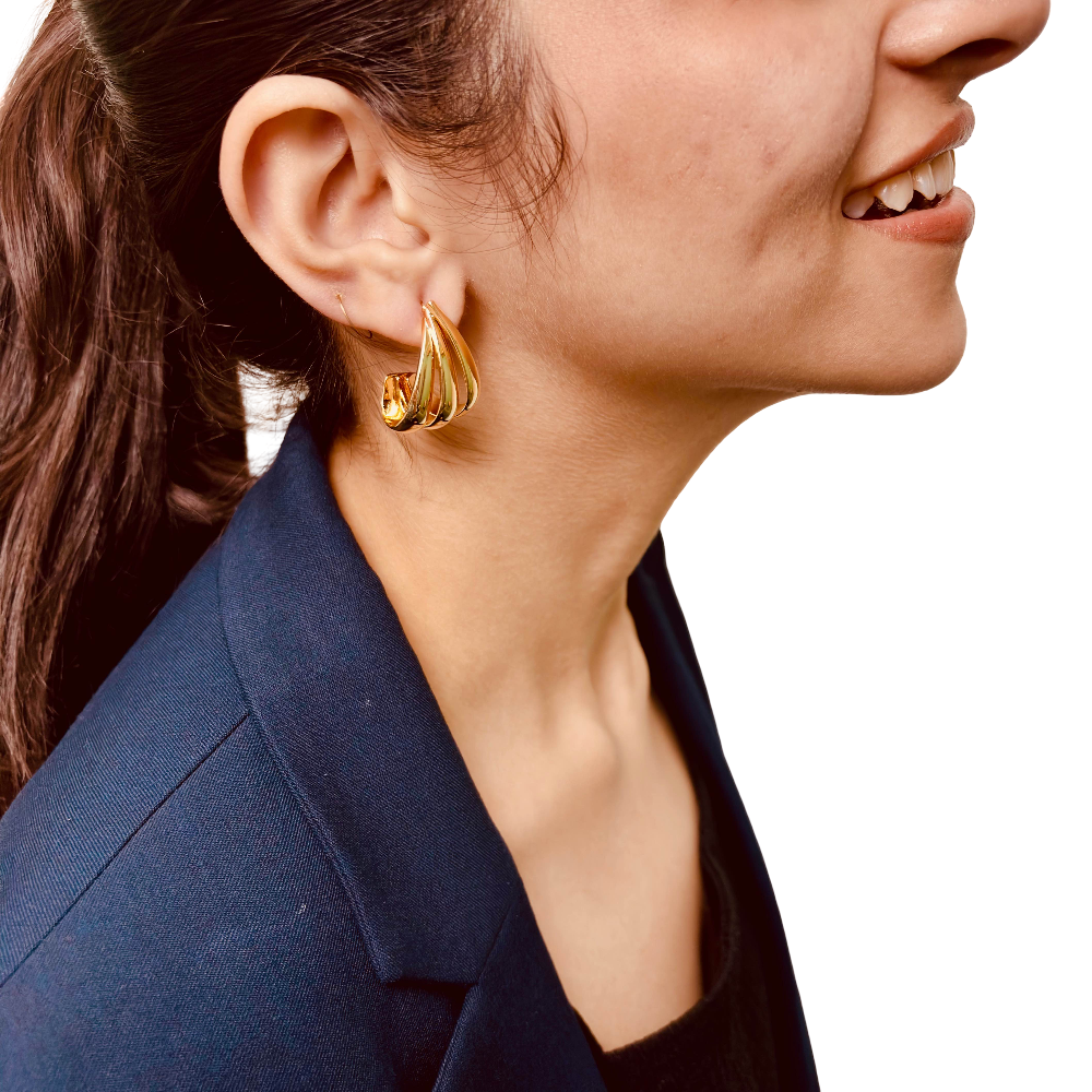 Model's side profile showing dainty layered drop earrings – lightweight daily wear – hypoallergenic gold-plated studs earrings - waterproof stainless steel gold-plated studs earrings - anti-tarnish gold-plated stainless steel minimal studs earring - Rakhi gifts for sister under 2000