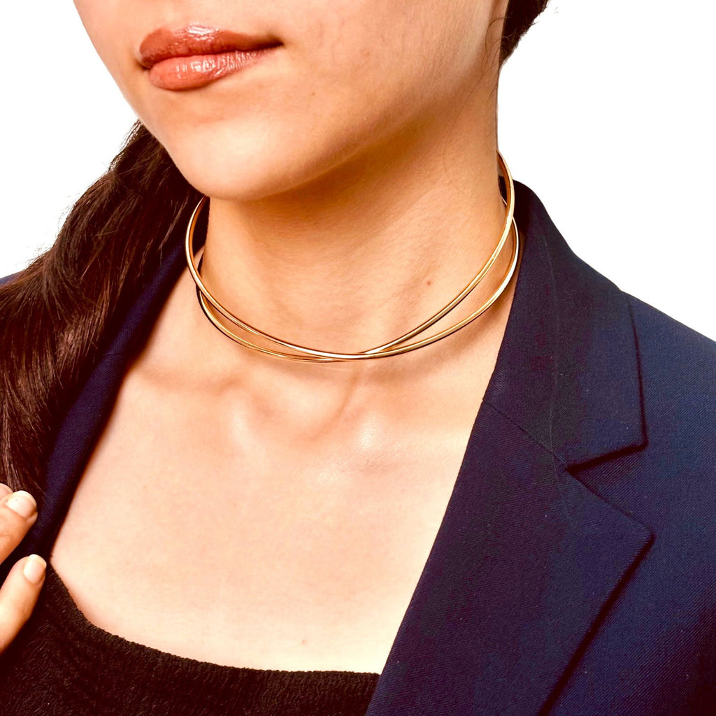 Model's angled shot of intertwined hasli highlighting chain texture and shine - Chic statement elegant gold plated choker - Rakhi gifts for sister under 2000 - jewelry Raksha Bandhan gifts