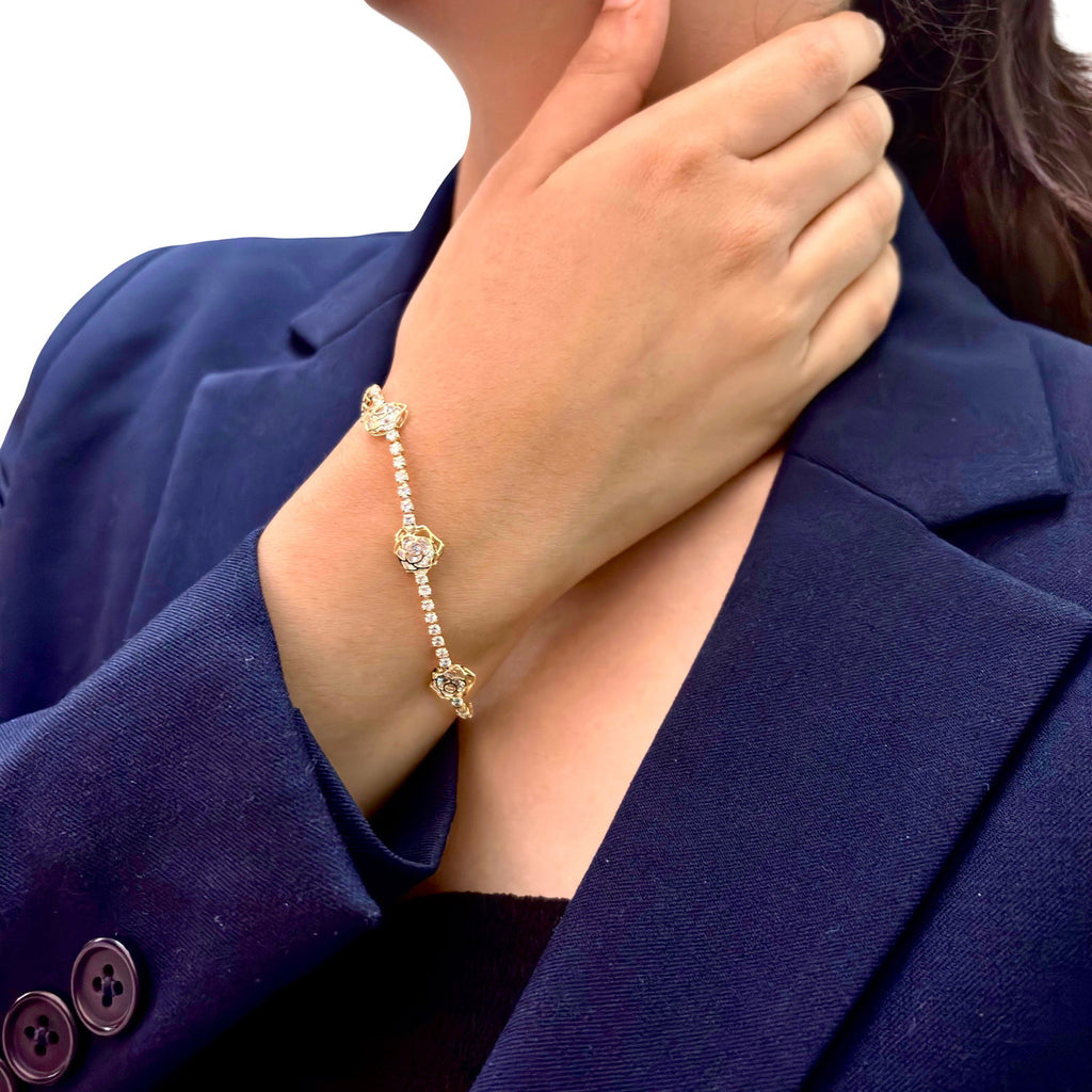 Model's front profile wearing elegant waterproof 18K gold plated cz tennis bracelet - hypoallergenic premium cz tennis bracelet gift for her under 2000 -  waterproof chic cz gold tennis bracelet anniversary gift under 2000 - affordable gold tennis bracelet stainless steel gift under 1500  - hypoallergenic cz tennis bracelet everyday wear - silver tennis bracelet gift for her - Rakhi gifts for sister under 2000 - jewelry Raksha Bandhan gifts