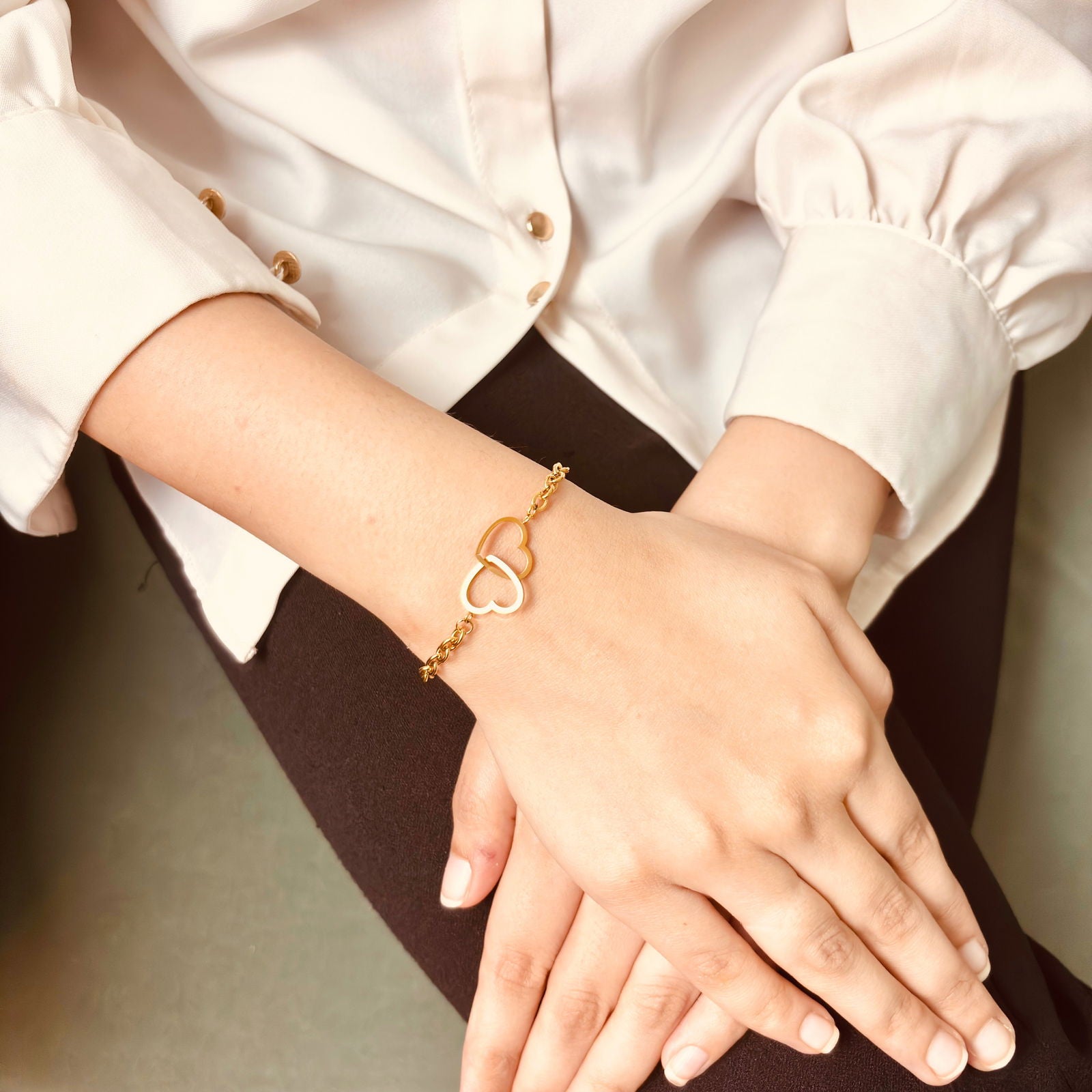 Model styling heart chain bracelet – perfect for gifting or layering - dainty chic minimalist elegant gold plated bracelet - hypoallergenic anti‑tarnish waterproof nickel‑free lead‑free gold plated bracelet