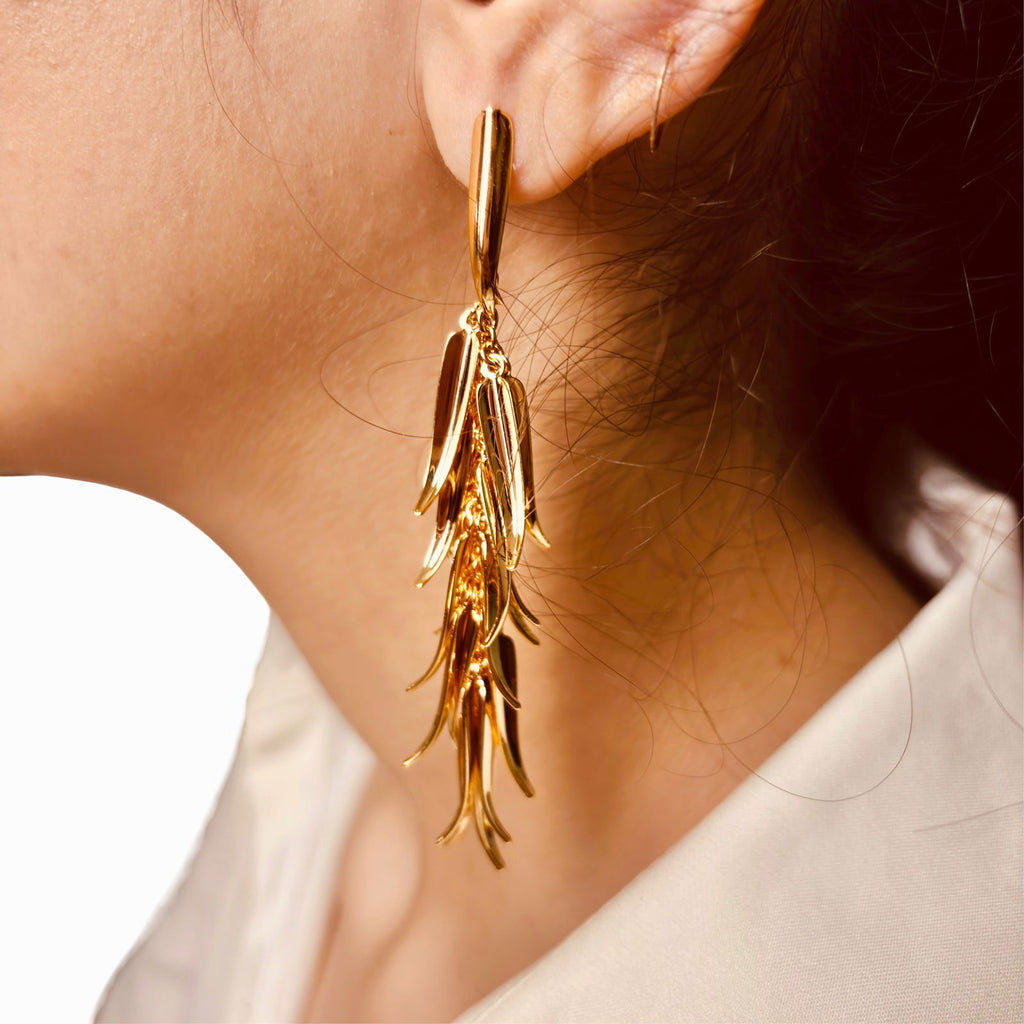 Close-up shot of Multi leaf long tassel earrings – gold-plated layered drop design - Statement elegant gold plated earrings - hypoallergenic anti‑tarnish waterproof nickel‑free lead‑free gold plated earrings - scratch‑resistant fade‑resistant water‑resistant gold plated earrings 