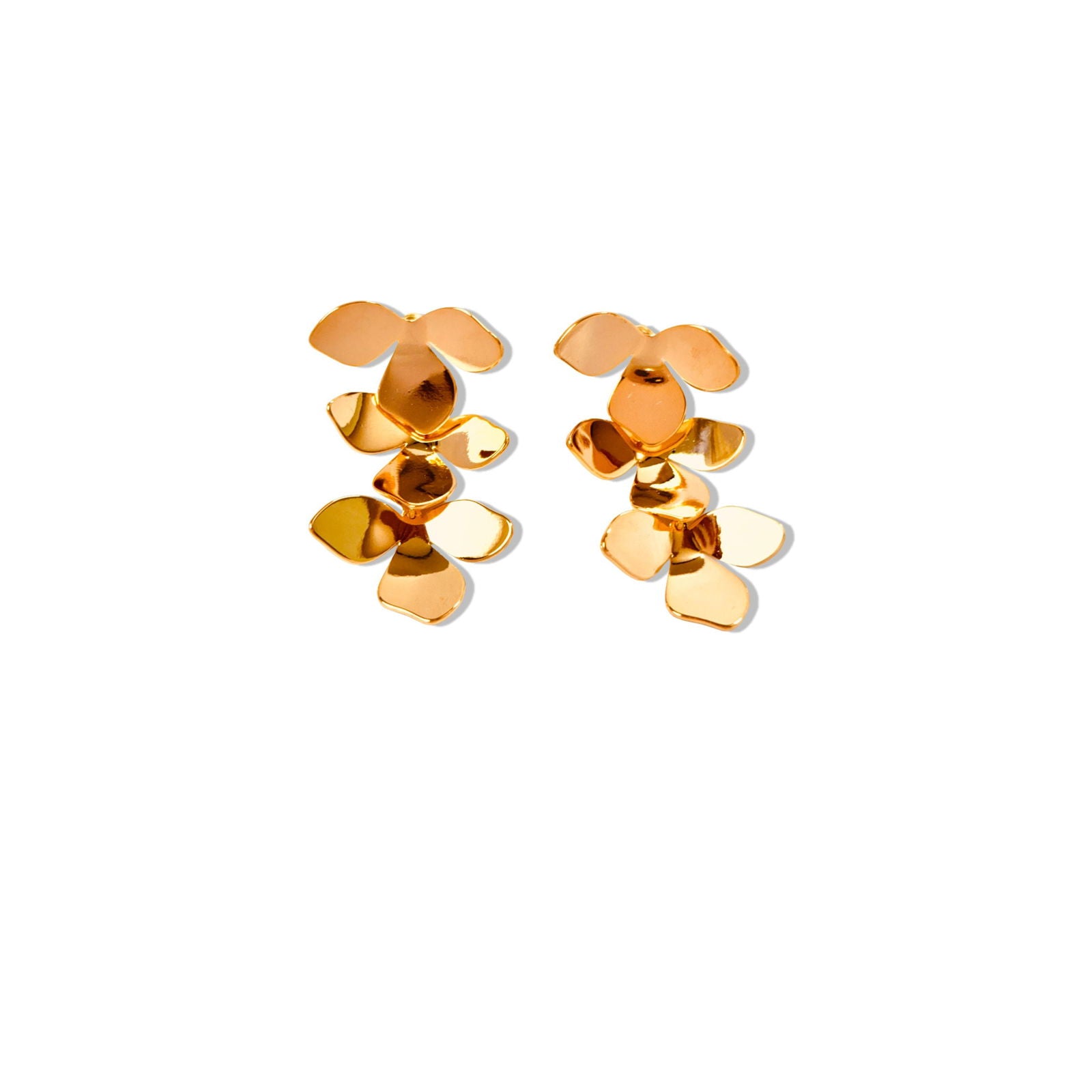 Flat-lay of gold clover petal earrings – delicate floral accents - Statement elegant gold plated earrings - hypoallergenic anti‑tarnish waterproof nickel‑free lead‑free gold plated earrings - scratch‑resistant fade‑resistant water‑resistant gold plated earrings 