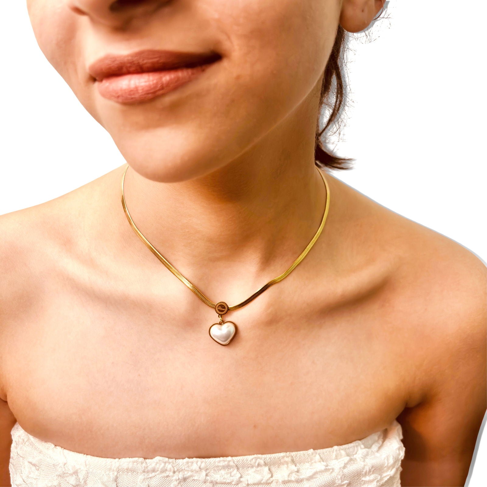 Model wearing heart pearl pendant – feminine everyday romance look - dainty gold plated necklace - hypoallergenic anti-tarnish waterproof gold plated necklace