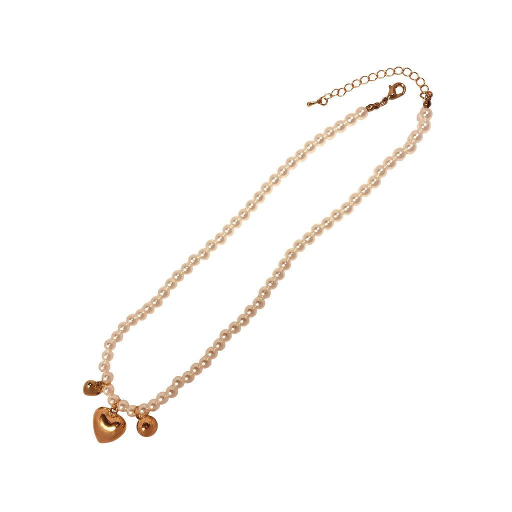 Flat-lay of pearl and heart charm clustered pearl necklace – soft romantic tones - chic anti-tarnish 18k gold plated three heart clustered pearl stainless steel necklace birthday gift for her ideas under 2000 - hypoallergenic clustered pearl heart necklace premium anniversary for her ideas under 2000 - waterproof 18K gold plated elegant necklace gift under 1500 - Rakhi gifts for sister under 2000 - jewelry Raksha Bandhan gifts - pearl necklace under 2000